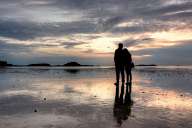 Couple in love on the beach of Saint-Malo